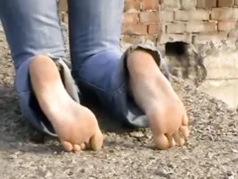 Mind-blowing teenager loves barefooting outdoor and being half-naked on cam. Foot fetish heaven.