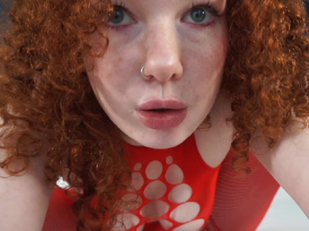 Red-haired teenie with Crimson hair thumbs herself to orgasmic orgasm on the sofa
