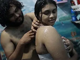 Desi Bhabhi likes getting moist in a crimson-scorching douche nearly a youthful boy