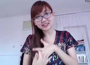Cute Chinese teen with glasses gets wild in a steamy drag queen chat