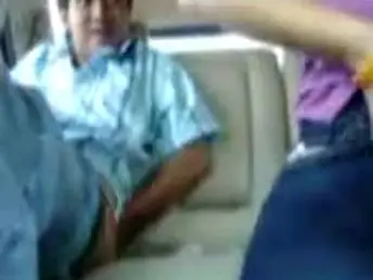 Malay GF enjoys automobile blowjob all over their way Chinese GF
