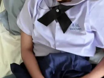 Watch Suwipha, a sexy Thai schoolgirl on every side college uniform, take a hard pounding from a thick beclouded rod
